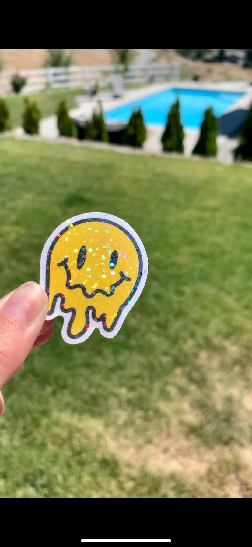 Melting Yellow and Checkered Smiley Face Sticker