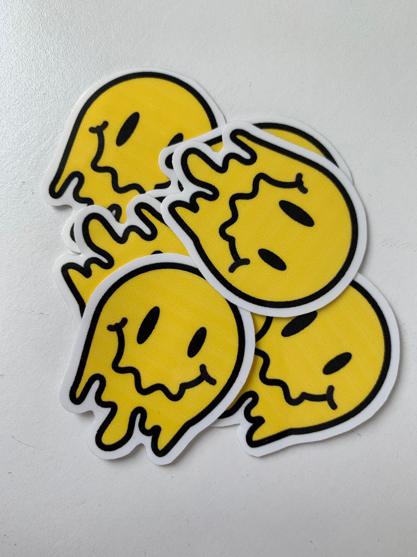 Melting Yellow and Checkered Smiley Face Sticker