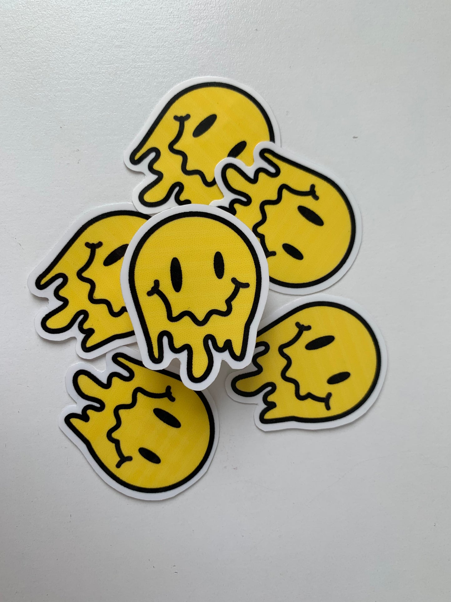 Melting Yellow and Checkered Smiley Face Sticker