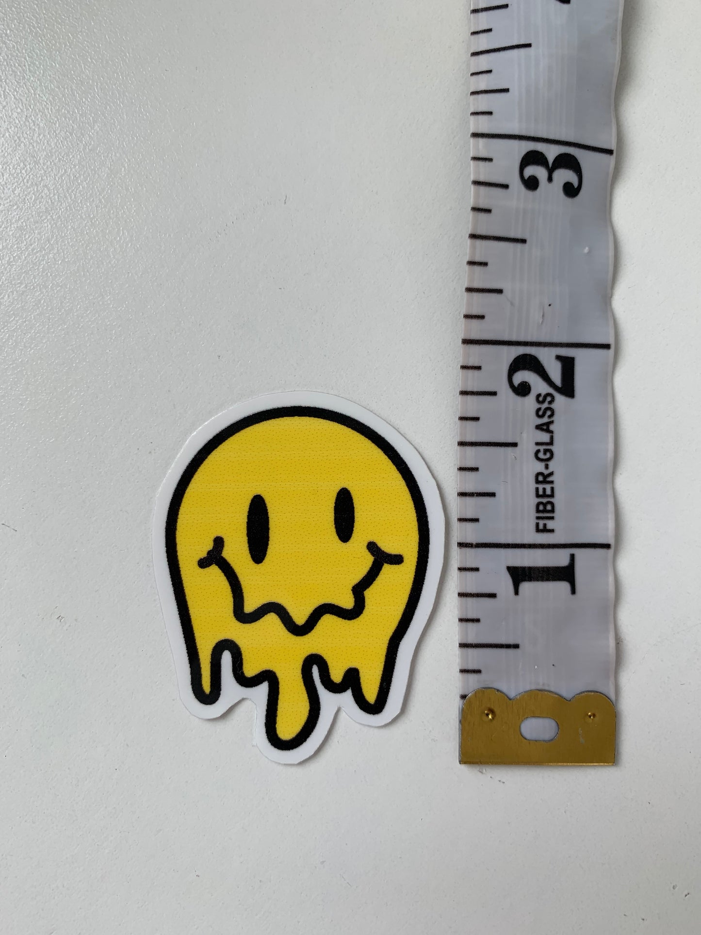 Melting Yellow and Checkered Smiley Face Sticker