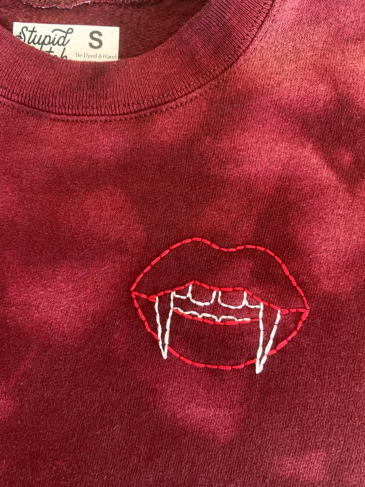 Hand Embroidered Vampire Lips with Bat Coffin on Tie Dye Maroon Fleece Long Sleeve Crew