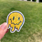 Melting Yellow and Checkered Smiley Face Sticker