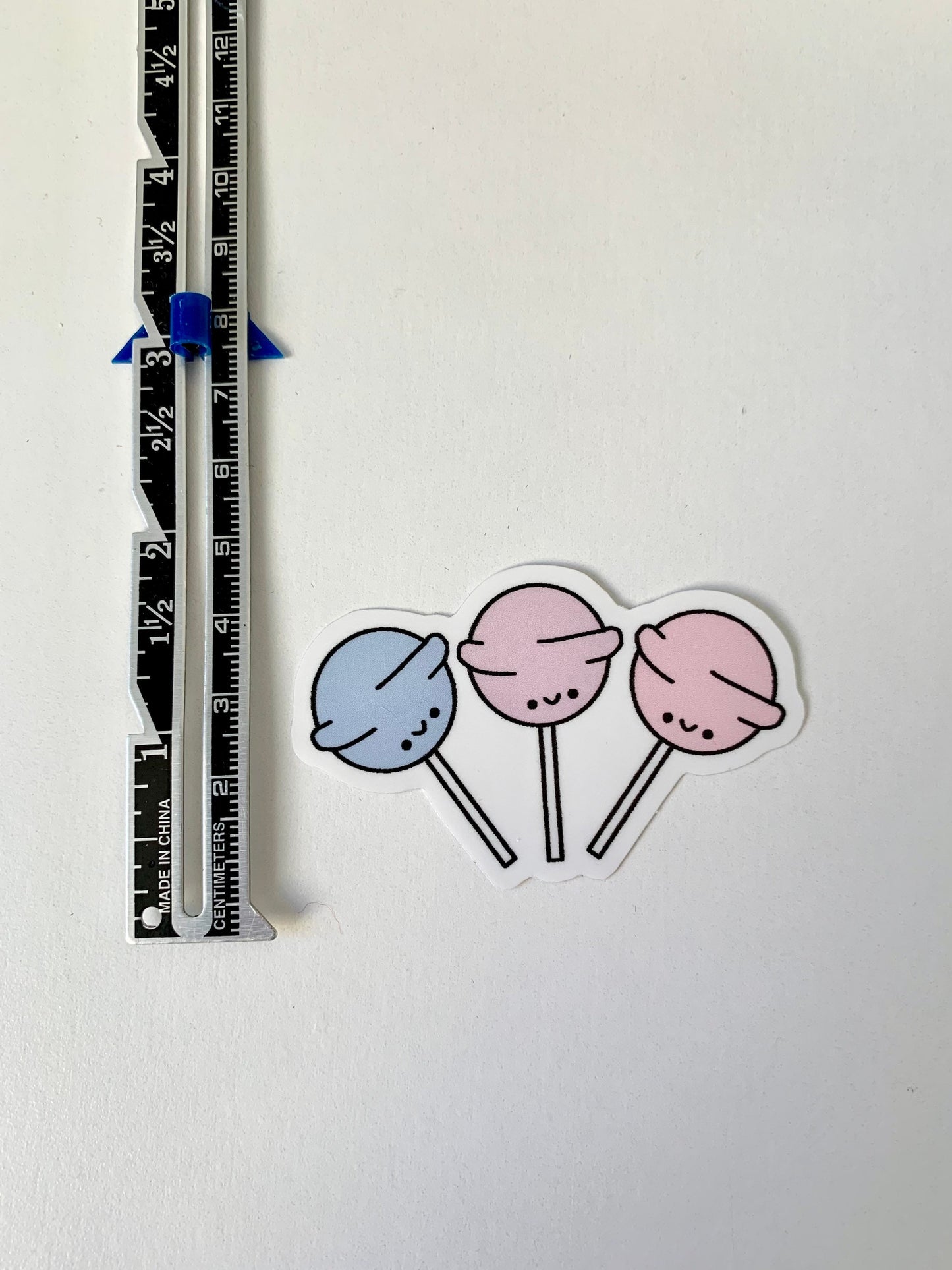 Kawaii Happy Smiling Pastel Colored Lollipops Trio Sticker