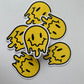 Melting Yellow and Checkered Smiley Face Sticker