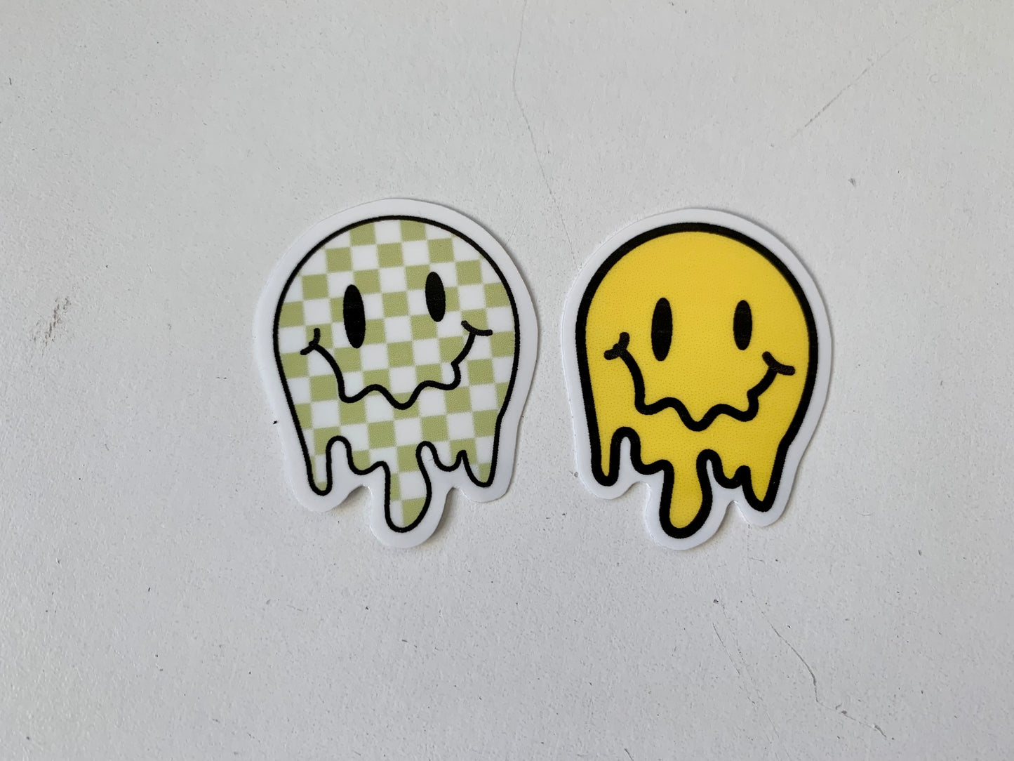 Melting Yellow and Checkered Smiley Face Sticker