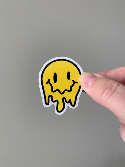 Melting Yellow and Checkered Smiley Face Sticker