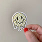 Melting Yellow and Checkered Smiley Face Sticker