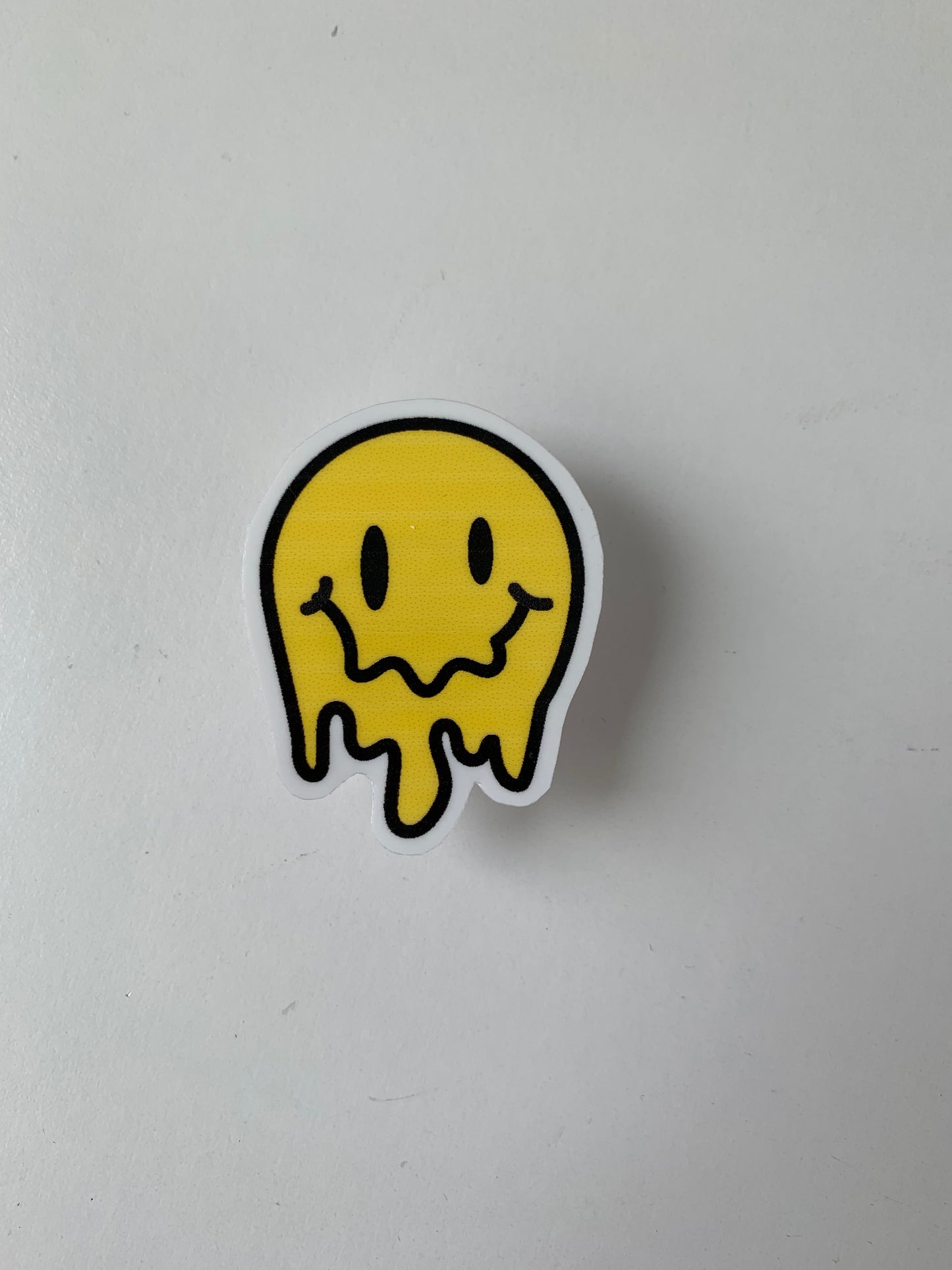 Melting Yellow and Checkered Smiley Face Sticker