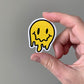 Melting Yellow and Checkered Smiley Face Sticker